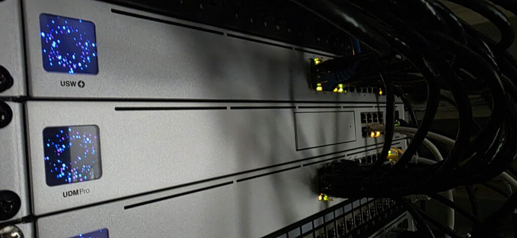 Business network rack with switches, patch panels, and structured cabling